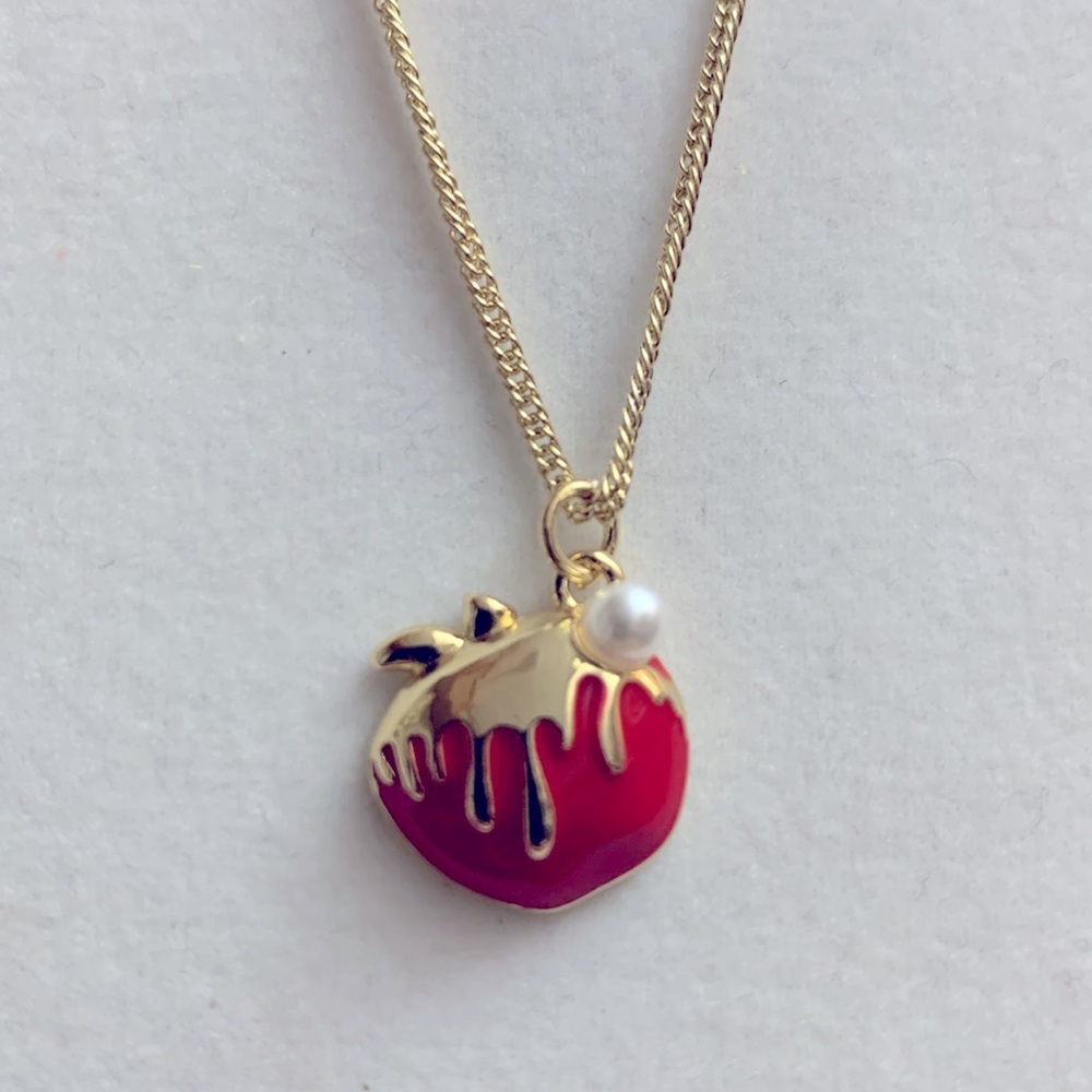 Golden Apple Necklace .